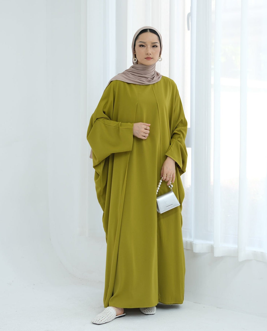 Get trendy with Izzy 2 in 1 Abaya Combo - Olive -  available at Voilee NY. Grab yours for $69.90 today!