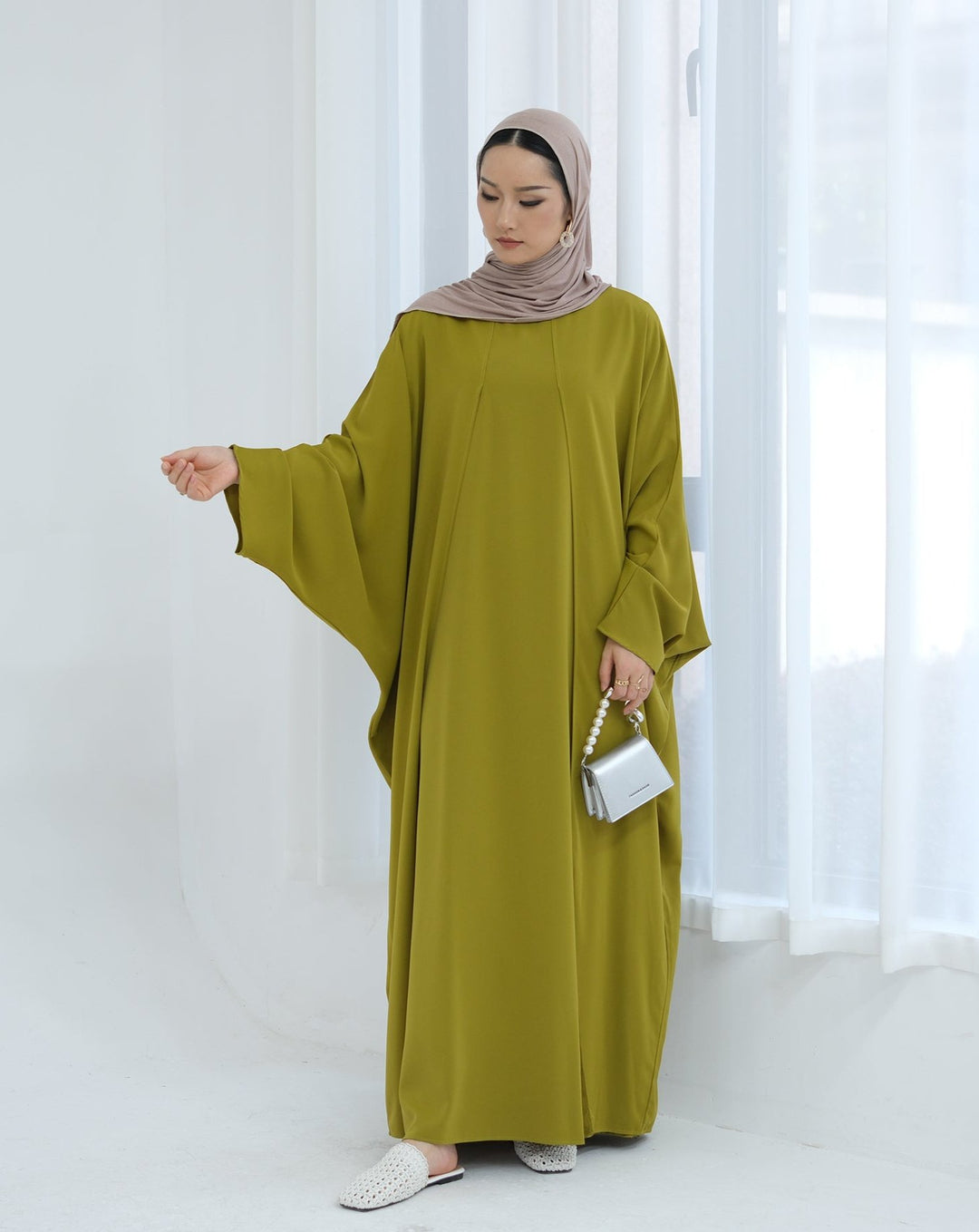 Get trendy with Izzy 2 in 1 Abaya Combo - Olive -  available at Voilee NY. Grab yours for $69.90 today!