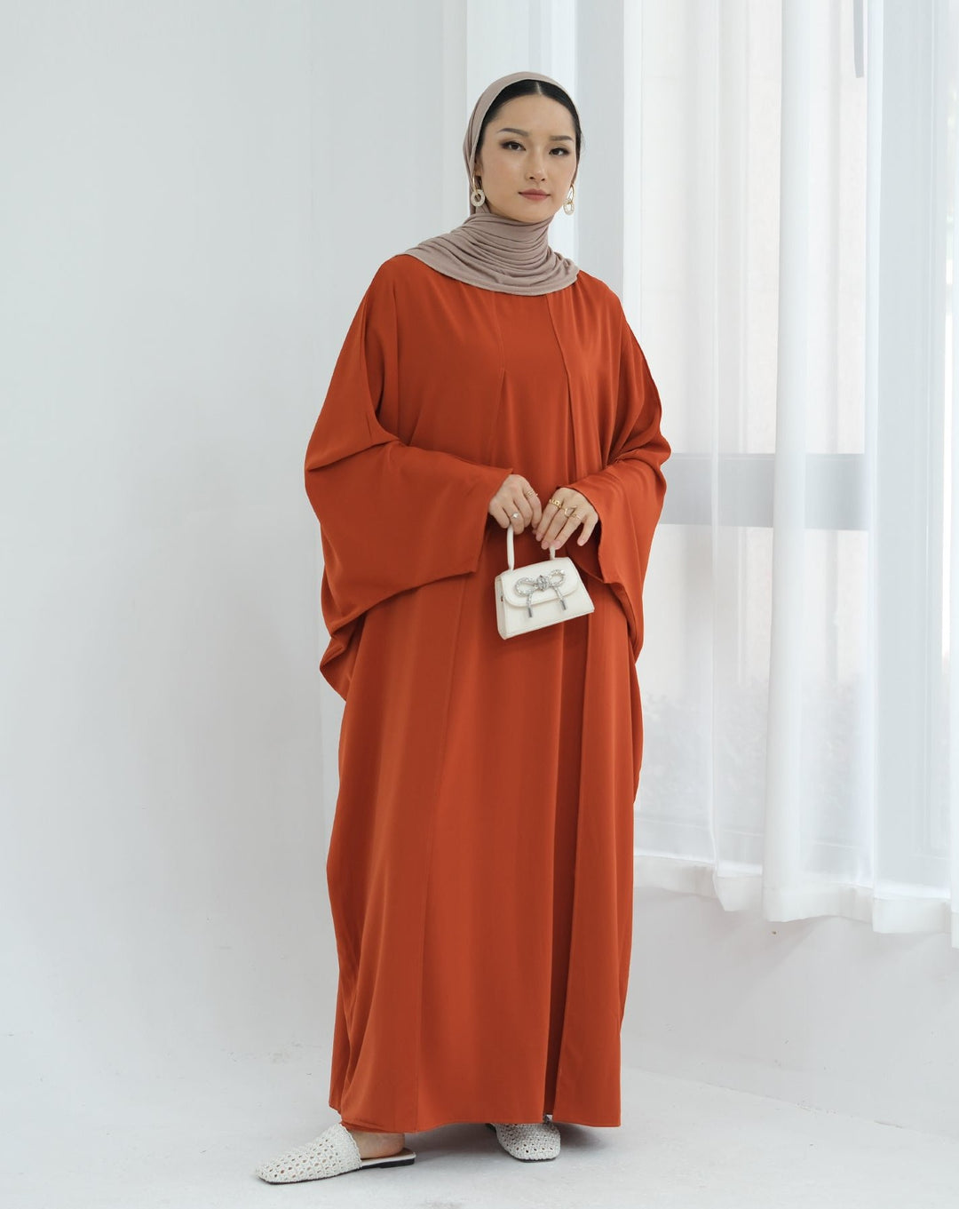 Get trendy with Izzy 2 in 1 Abaya Combo - Rust -  available at Voilee NY. Grab yours for $69.90 today!