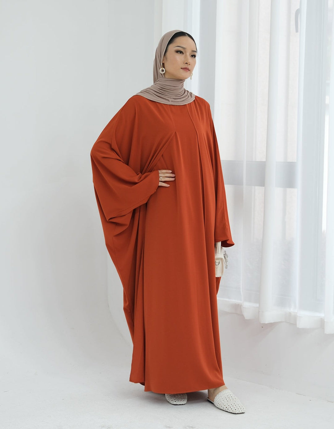 Get trendy with Izzy 2 in 1 Abaya Combo - Rust -  available at Voilee NY. Grab yours for $69.90 today!