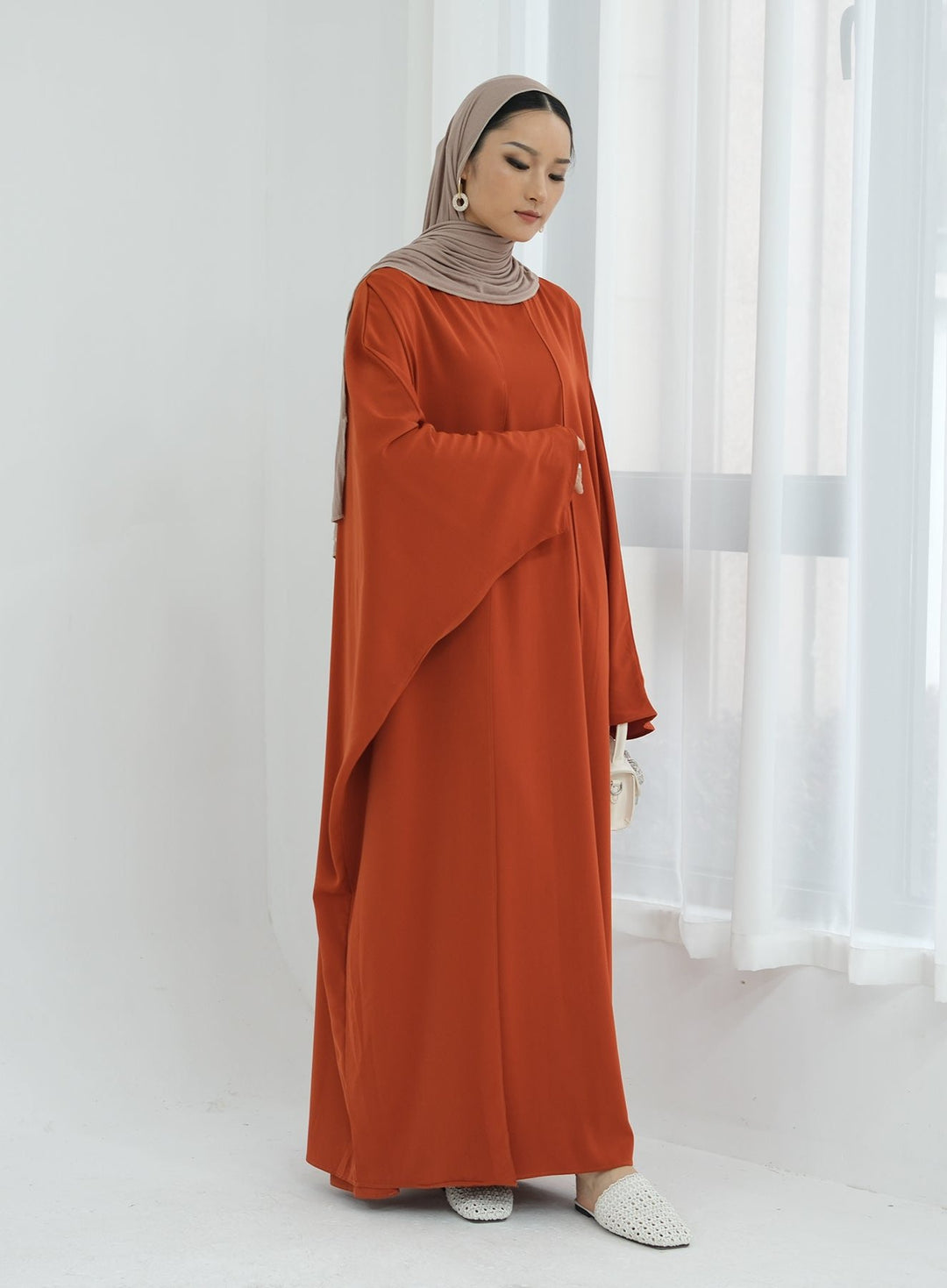 Get trendy with Izzy 2 in 1 Abaya Combo - Rust -  available at Voilee NY. Grab yours for $69.90 today!