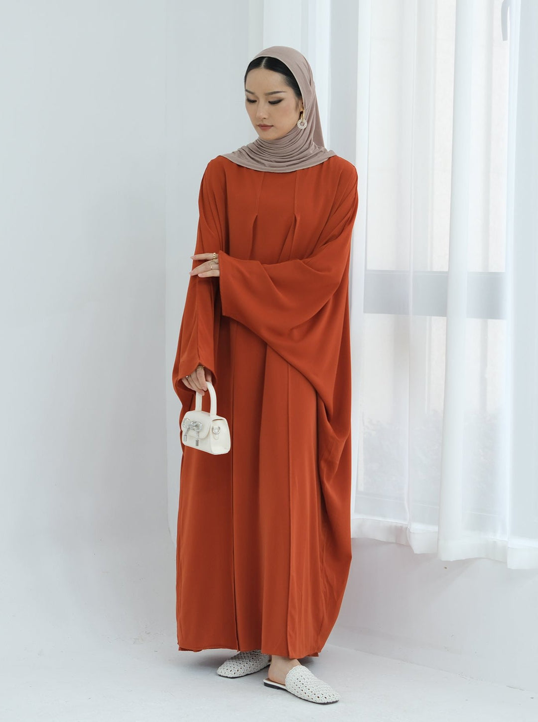 Get trendy with Izzy 2 in 1 Abaya Combo - Rust -  available at Voilee NY. Grab yours for $69.90 today!