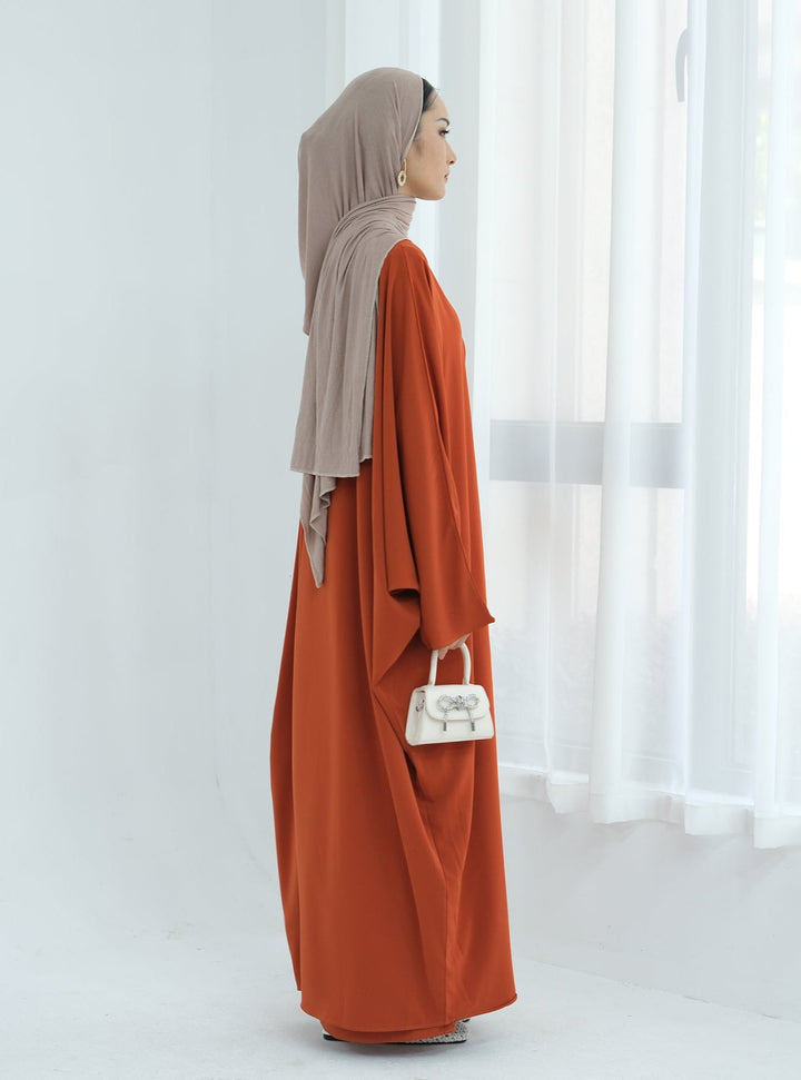 Get trendy with Izzy 2 in 1 Abaya Combo - Rust -  available at Voilee NY. Grab yours for $69.90 today!