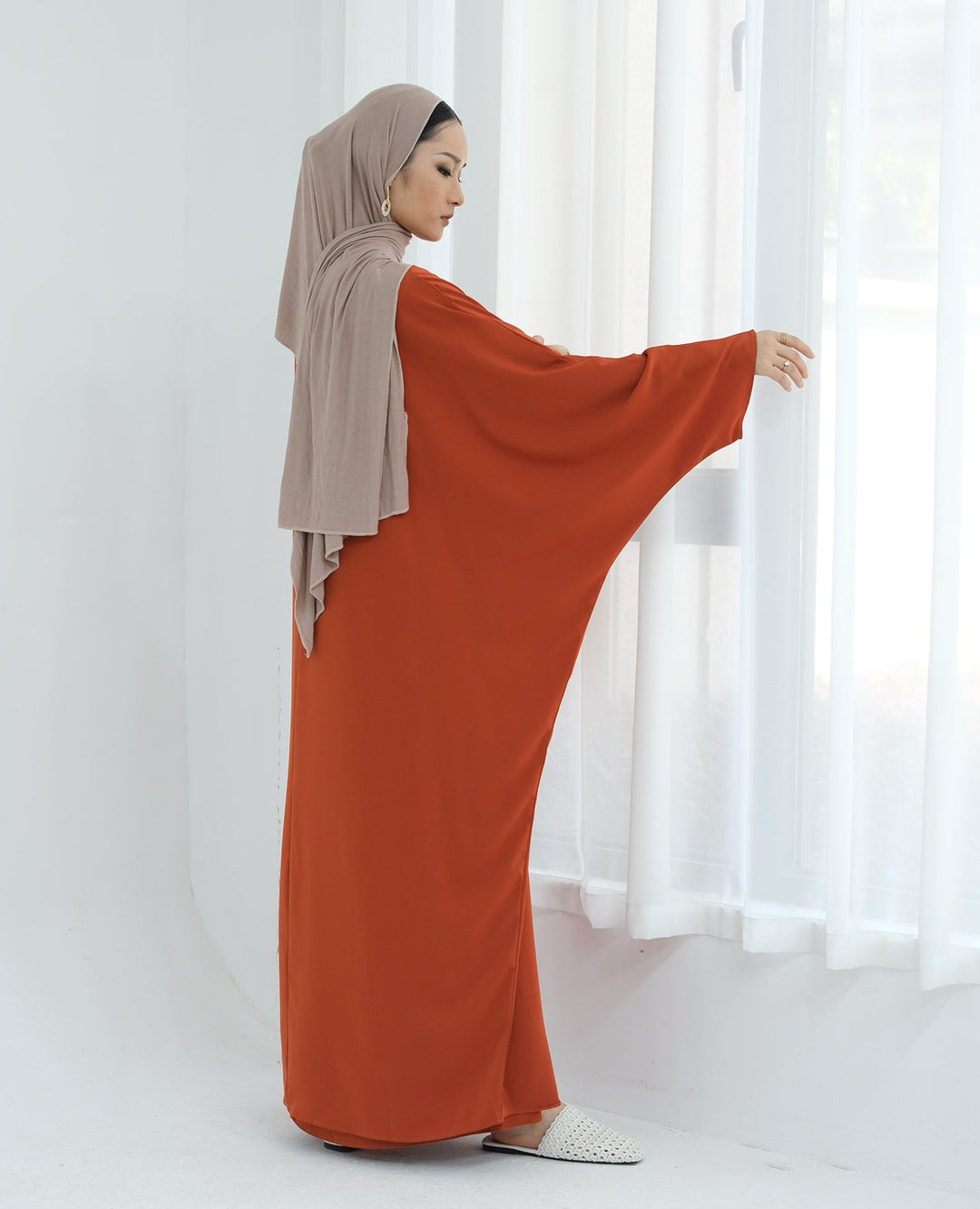 Get trendy with Izzy 2 in 1 Abaya Combo - Rust -  available at Voilee NY. Grab yours for $69.90 today!