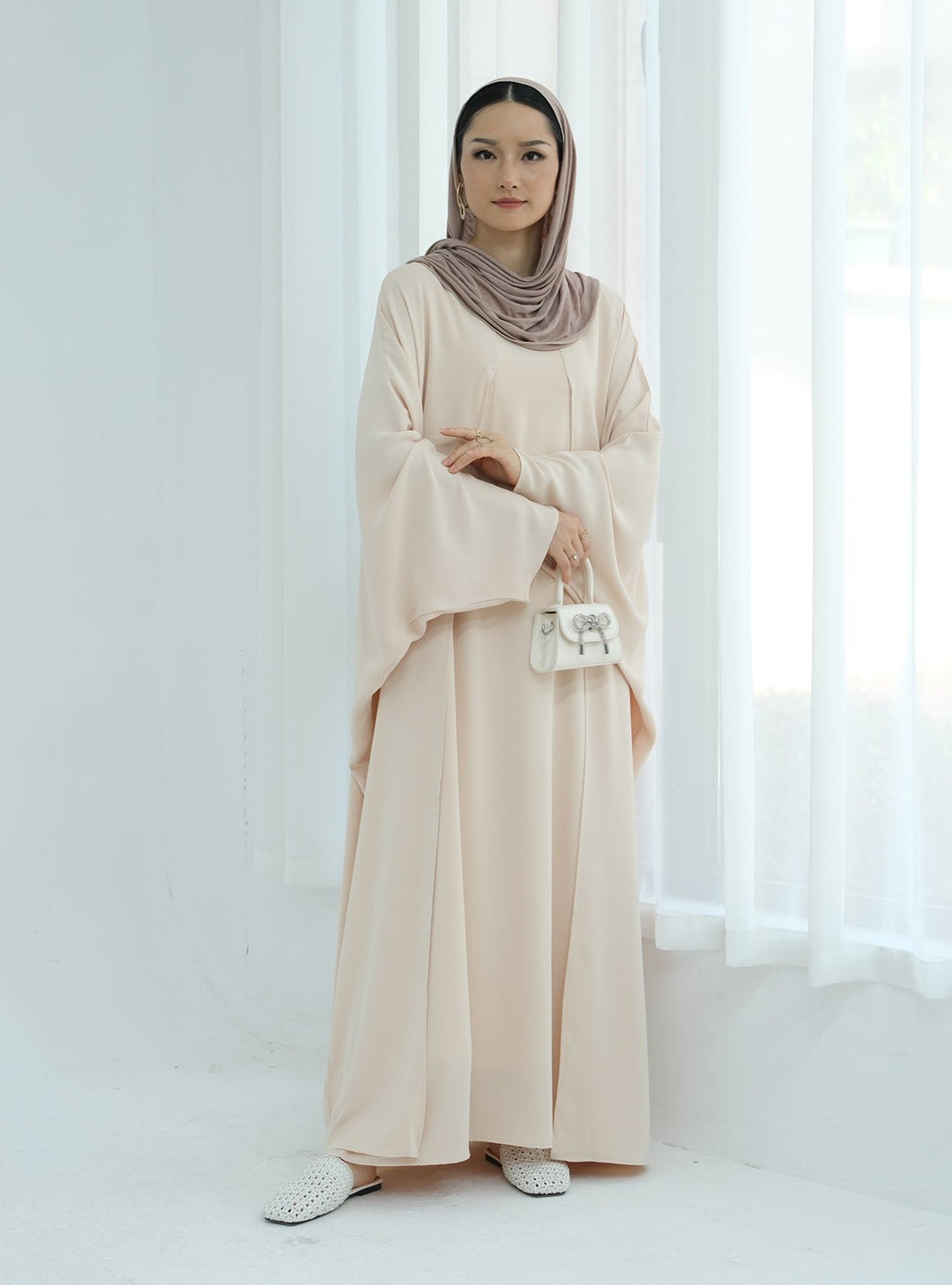 Get trendy with Izzy 2 in 1 Abaya Combo - Beige -  available at Voilee NY. Grab yours for $69.90 today!