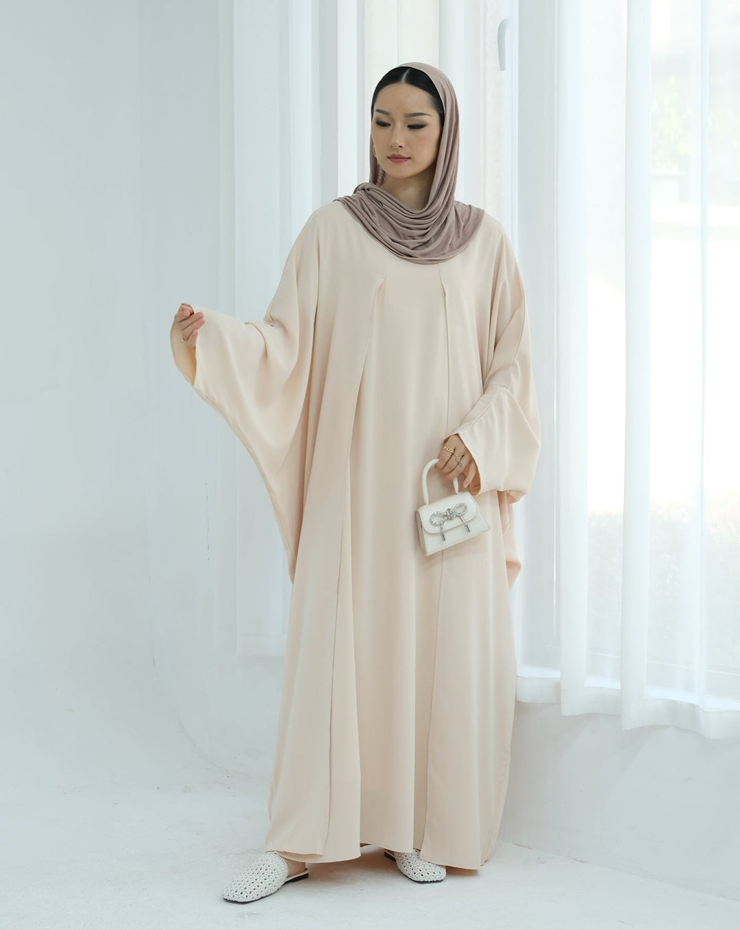 Get trendy with Izzy 2 in 1 Abaya Combo - Beige -  available at Voilee NY. Grab yours for $69.90 today!