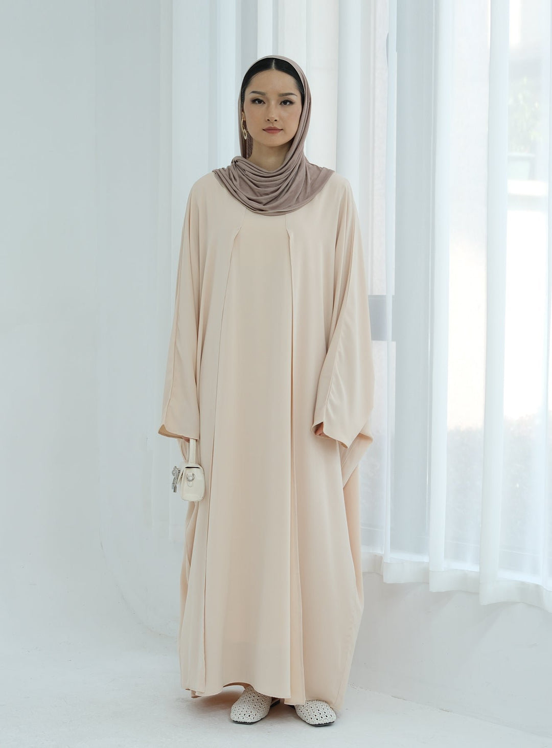 Get trendy with Izzy 2 in 1 Abaya Combo - Beige -  available at Voilee NY. Grab yours for $69.90 today!