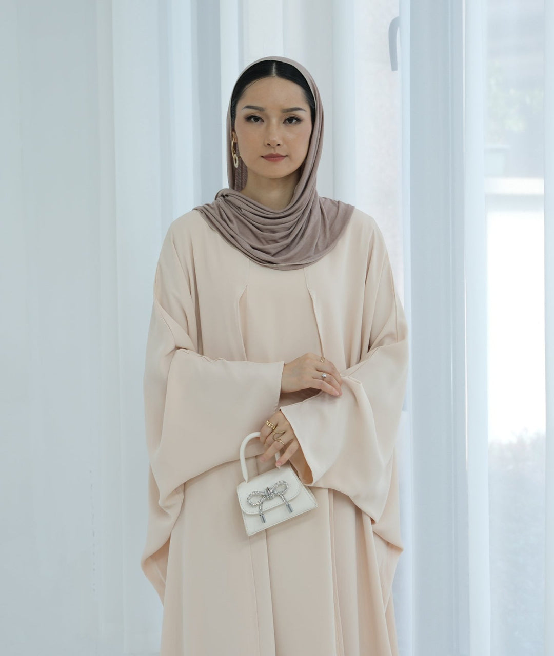 Get trendy with Izzy 2 in 1 Abaya Combo - Beige -  available at Voilee NY. Grab yours for $69.90 today!