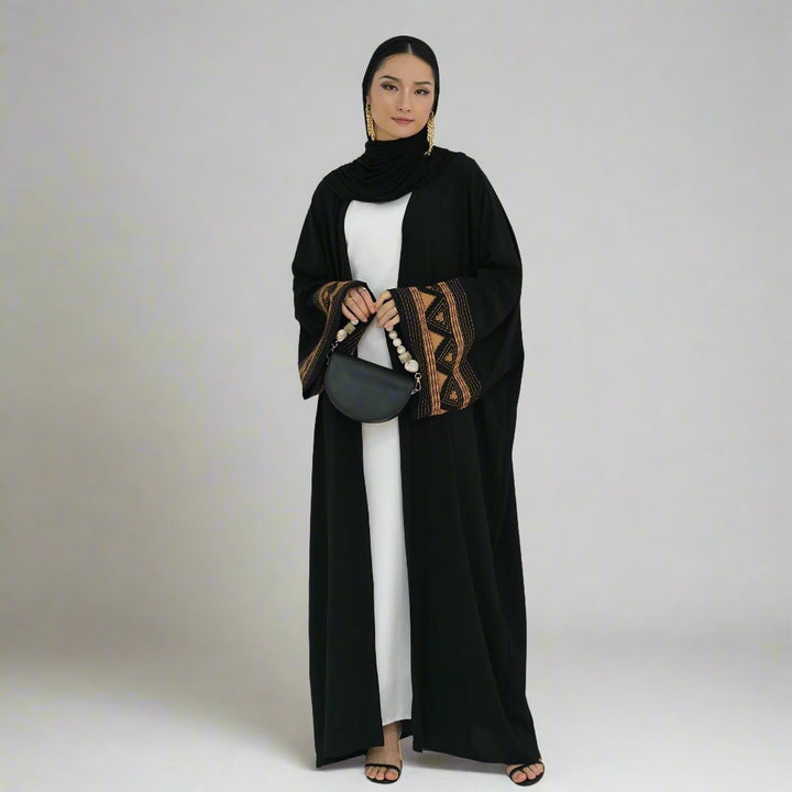 Get trendy with Amber Open Abaya Kimono - Black -  available at Voilee NY. Grab yours for $59.90 today!