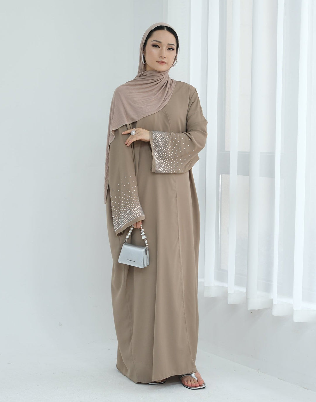 Get trendy with Mariya Rhinestone Open Abaya Kimono - Beige -  available at Voilee NY. Grab yours for $64.90 today!