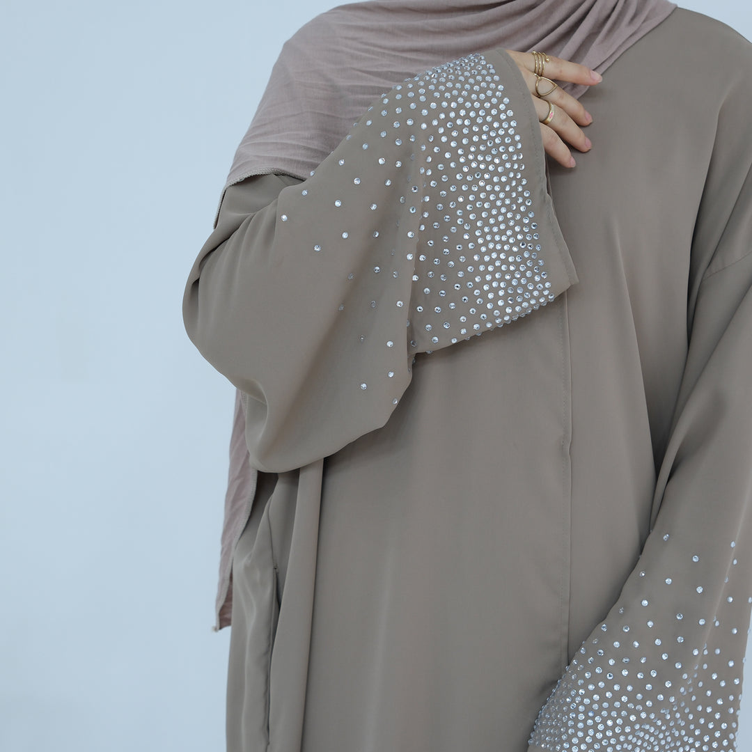 Get trendy with Mariya Rhinestone Open Abaya Kimono - Beige -  available at Voilee NY. Grab yours for $64.90 today!