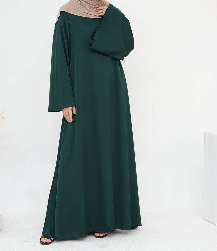 Get trendy with Calista Trumpet Sleeves Satin Dress - Emerald - Dresses available at Voilee NY. Grab yours for $59.90 today!