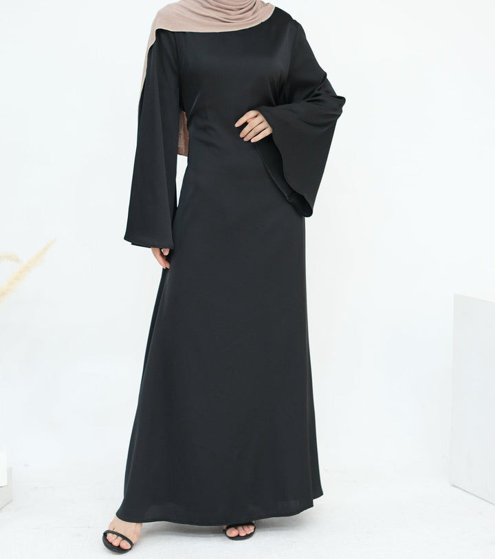 Get trendy with Calista Trumpet Sleeves Satin Dress - Black - Dresses available at Voilee NY. Grab yours for $59.90 today!