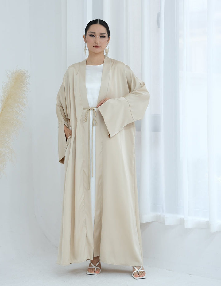 Get trendy with Lavinia Satin Open Abaya - Beige - Cardigan available at Voilee NY. Grab yours for $62.90 today!