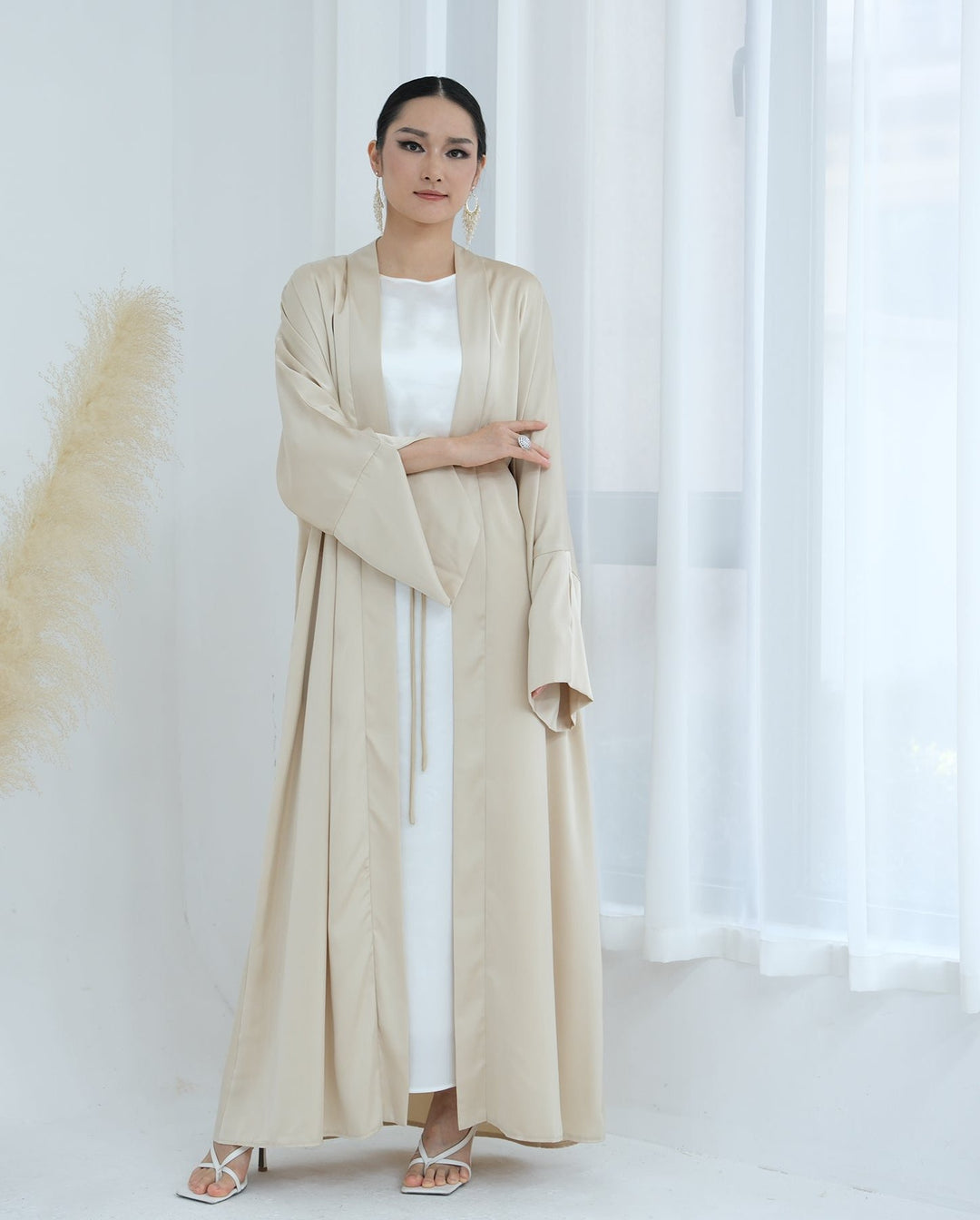 Get trendy with Lavinia Satin Open Abaya - Beige - Cardigan available at Voilee NY. Grab yours for $62.90 today!