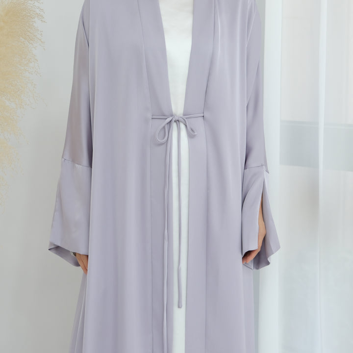 Get trendy with Lavinia Satin Open Abaya - Lavender - Cardigan available at Voilee NY. Grab yours for $62.90 today!