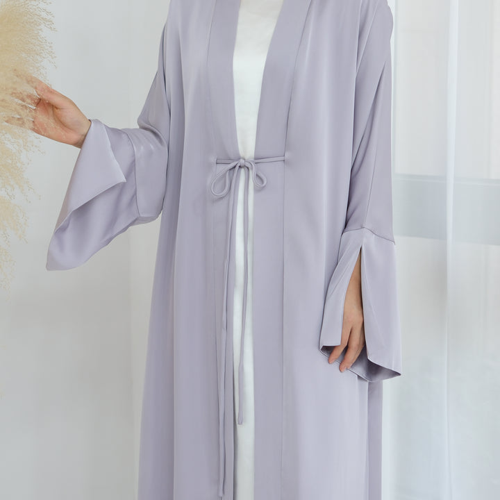 Get trendy with Lavinia Satin Open Abaya - Lavender - Cardigan available at Voilee NY. Grab yours for $62.90 today!