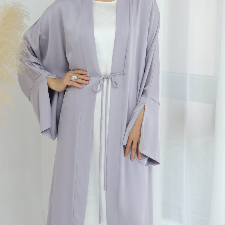 Get trendy with Lavinia Satin Open Abaya - Lavender - Cardigan available at Voilee NY. Grab yours for $62.90 today!