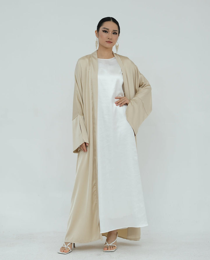 Get trendy with Lavinia Satin Open Abaya - Beige - Cardigan available at Voilee NY. Grab yours for $62.90 today!