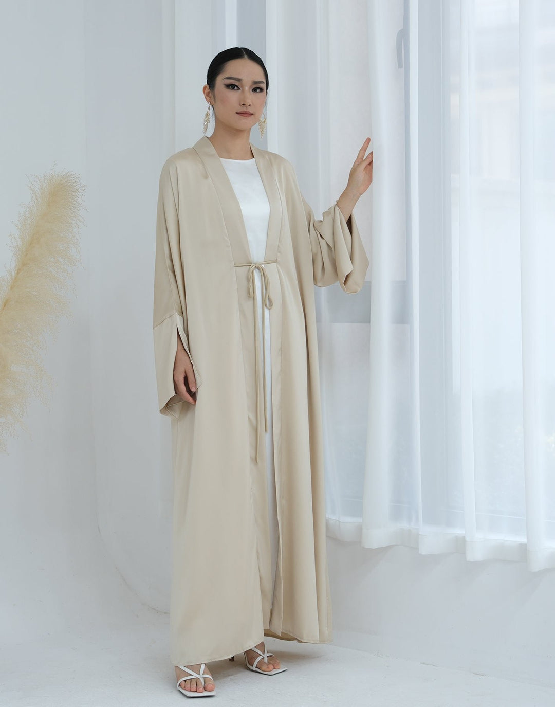 Get trendy with Lavinia Satin Open Abaya - Beige - Cardigan available at Voilee NY. Grab yours for $62.90 today!