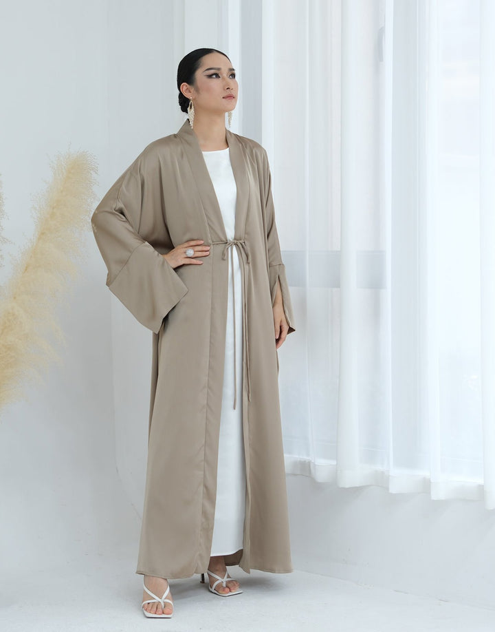 Get trendy with Lavinia Satin Open Abaya - Champagne - Cardigan available at Voilee NY. Grab yours for $62.90 today!