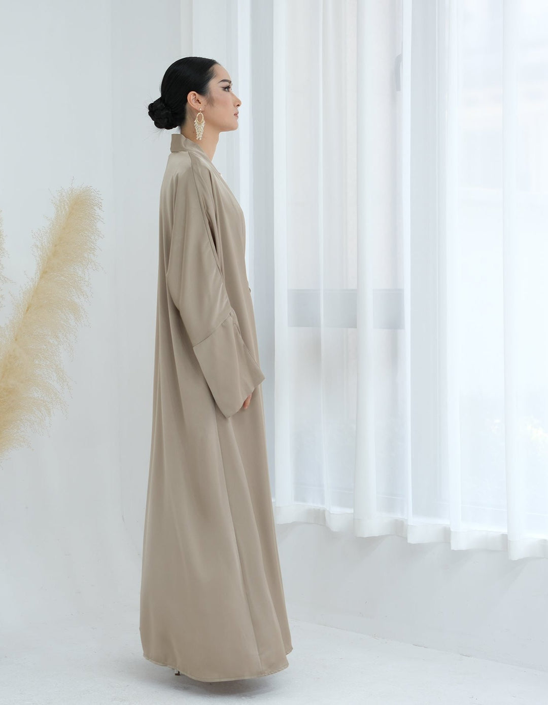 Get trendy with Lavinia Satin Open Abaya - Champagne - Cardigan available at Voilee NY. Grab yours for $62.90 today!