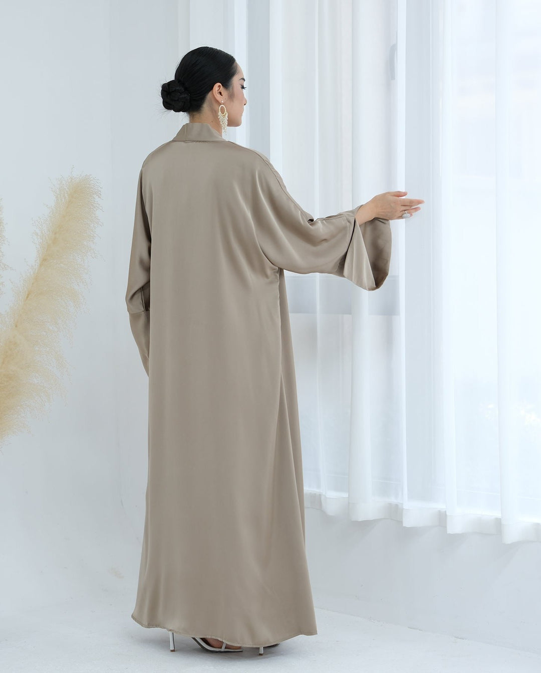 Get trendy with Lavinia Satin Open Abaya - Champagne - Cardigan available at Voilee NY. Grab yours for $62.90 today!