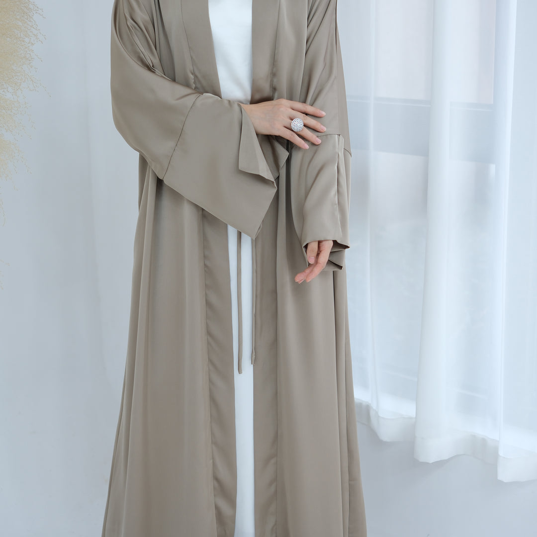 Get trendy with Lavinia Satin Open Abaya - Champagne - Cardigan available at Voilee NY. Grab yours for $62.90 today!