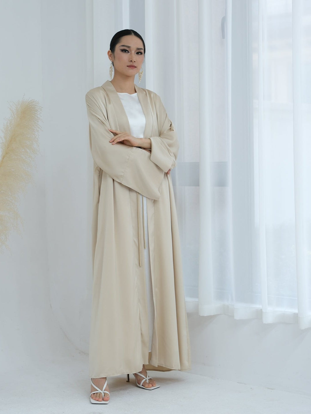 Get trendy with Lavinia Satin Open Abaya - Beige - Cardigan available at Voilee NY. Grab yours for $62.90 today!