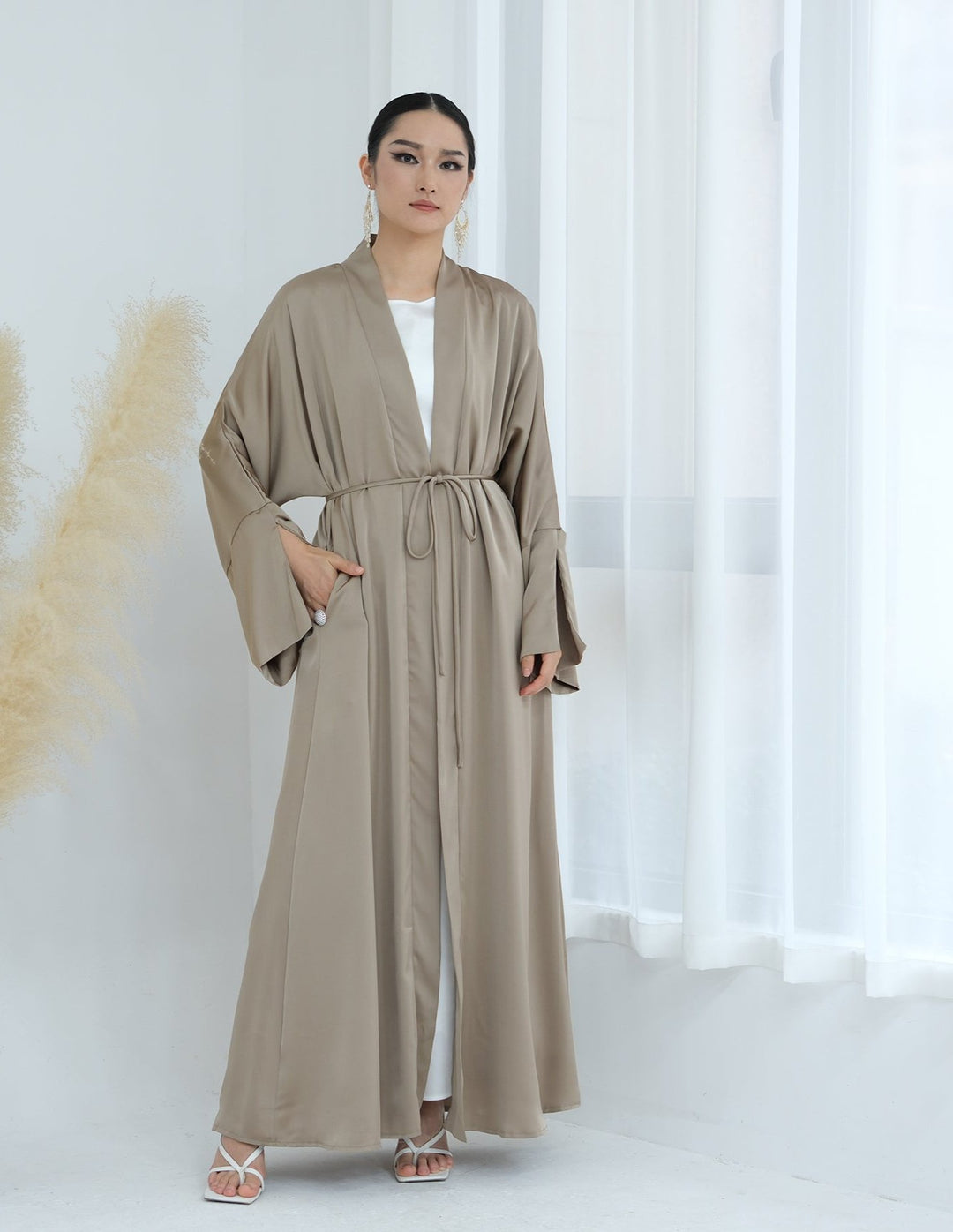 Get trendy with Lavinia Satin Open Abaya - Champagne - Cardigan available at Voilee NY. Grab yours for $62.90 today!