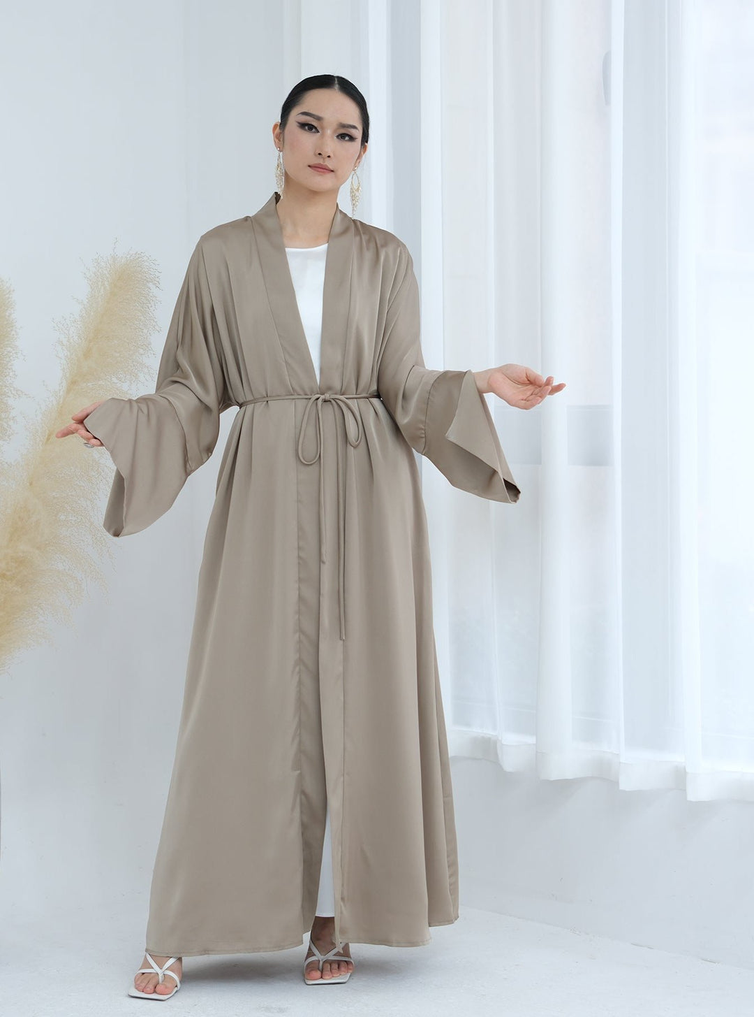 Get trendy with Lavinia Satin Open Abaya - Champagne - Cardigan available at Voilee NY. Grab yours for $62.90 today!