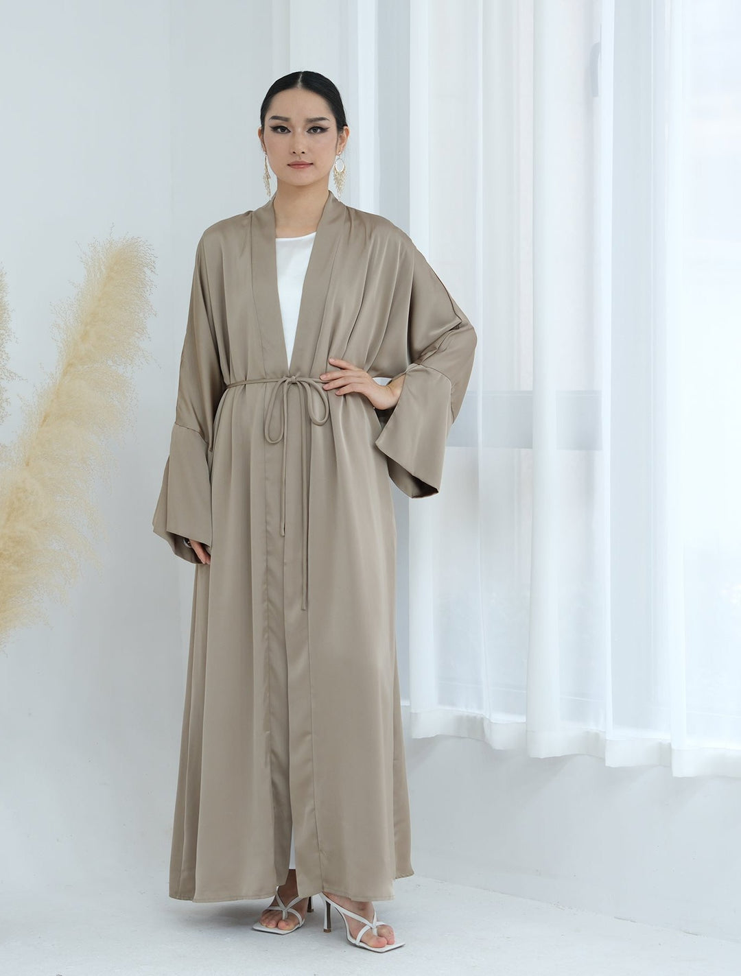 Get trendy with Lavinia Satin Open Abaya - Champagne - Cardigan available at Voilee NY. Grab yours for $62.90 today!