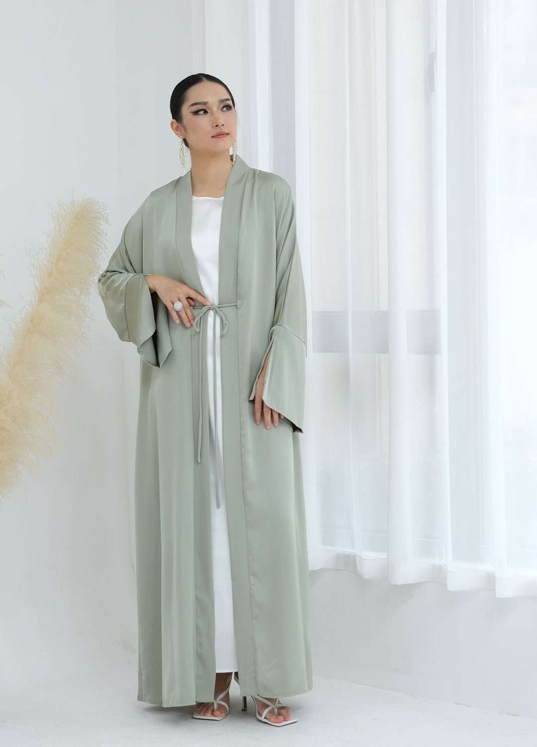 Get trendy with Lavinia Satin Open Abaya - Sage - Cardigan available at Voilee NY. Grab yours for $62.90 today!