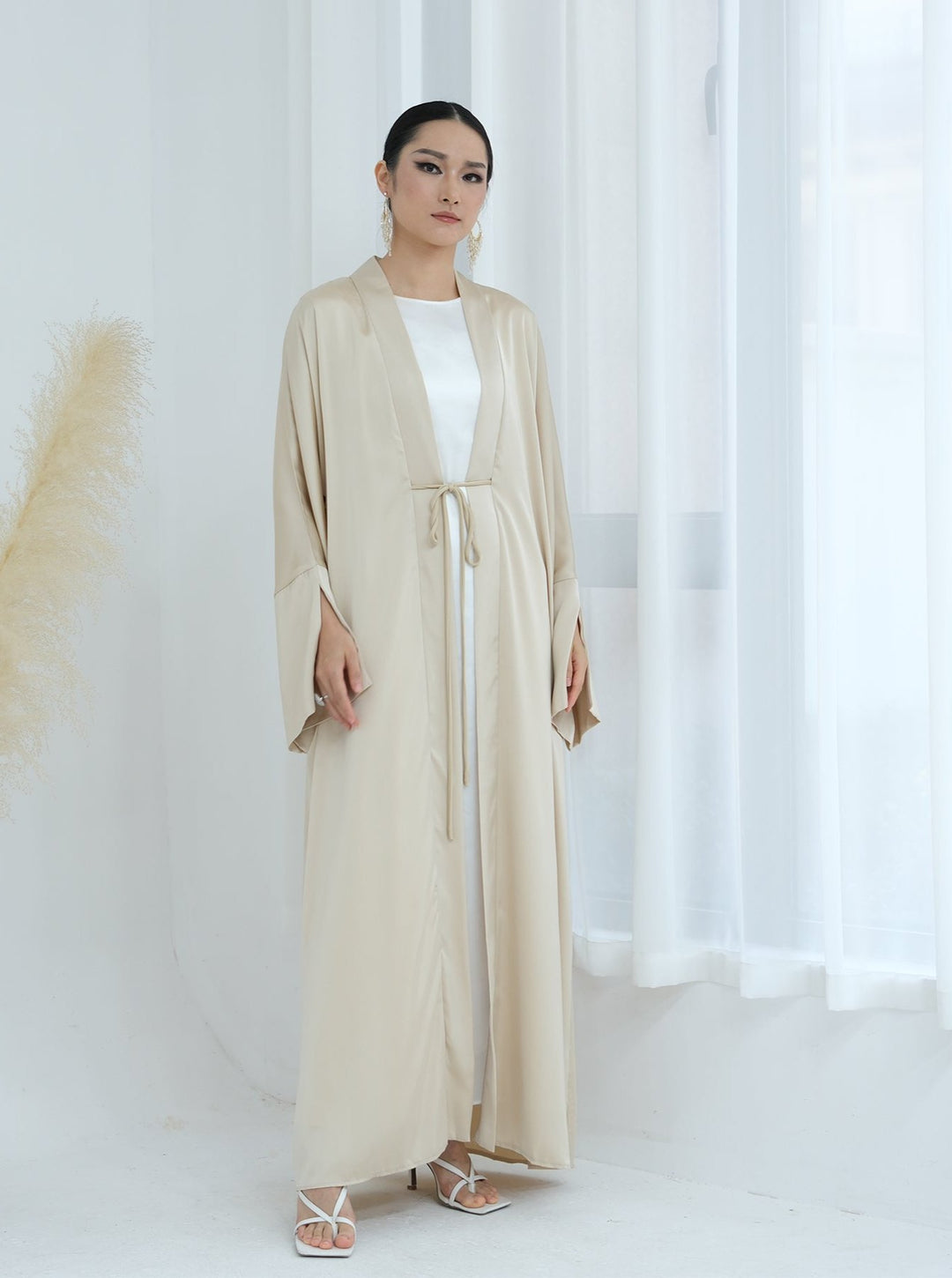 Get trendy with Lavinia Satin Open Abaya - Beige - Cardigan available at Voilee NY. Grab yours for $62.90 today!