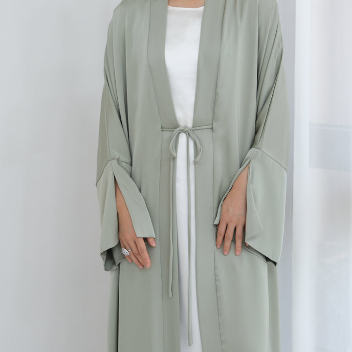 Get trendy with Lavinia Satin Open Abaya - Sage - Cardigan available at Voilee NY. Grab yours for $62.90 today!