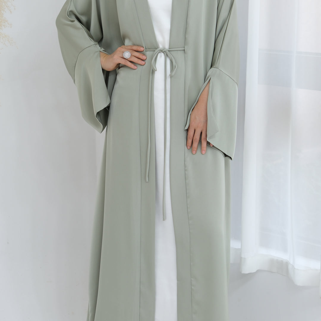 Get trendy with Lavinia Satin Open Abaya - Sage - Cardigan available at Voilee NY. Grab yours for $62.90 today!