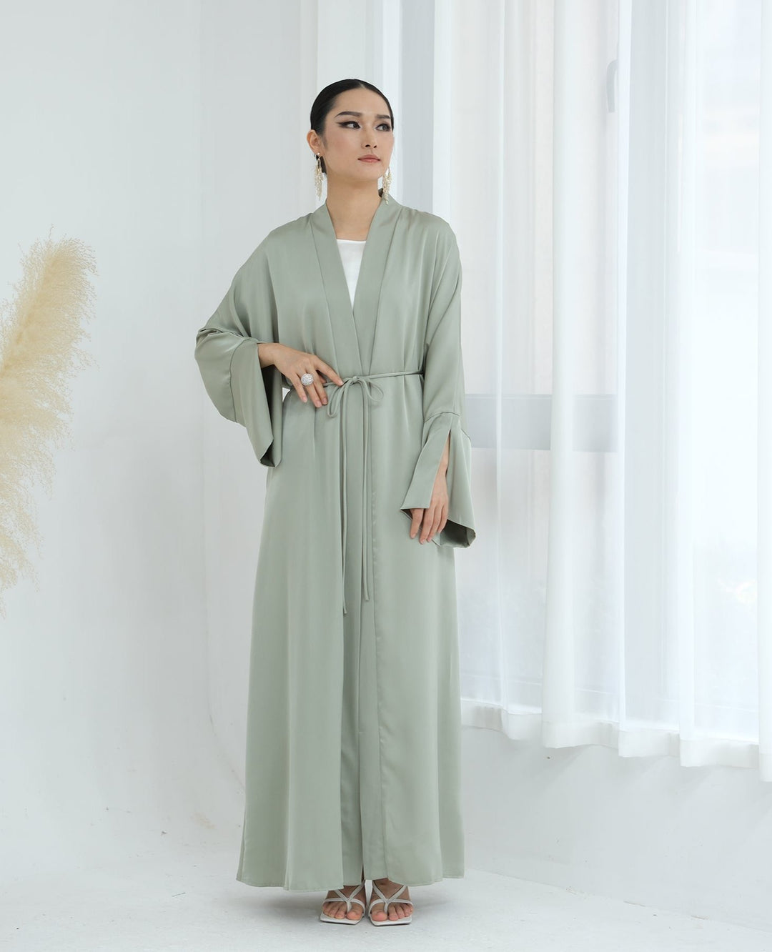 Get trendy with Lavinia Satin Open Abaya - Sage - Cardigan available at Voilee NY. Grab yours for $62.90 today!