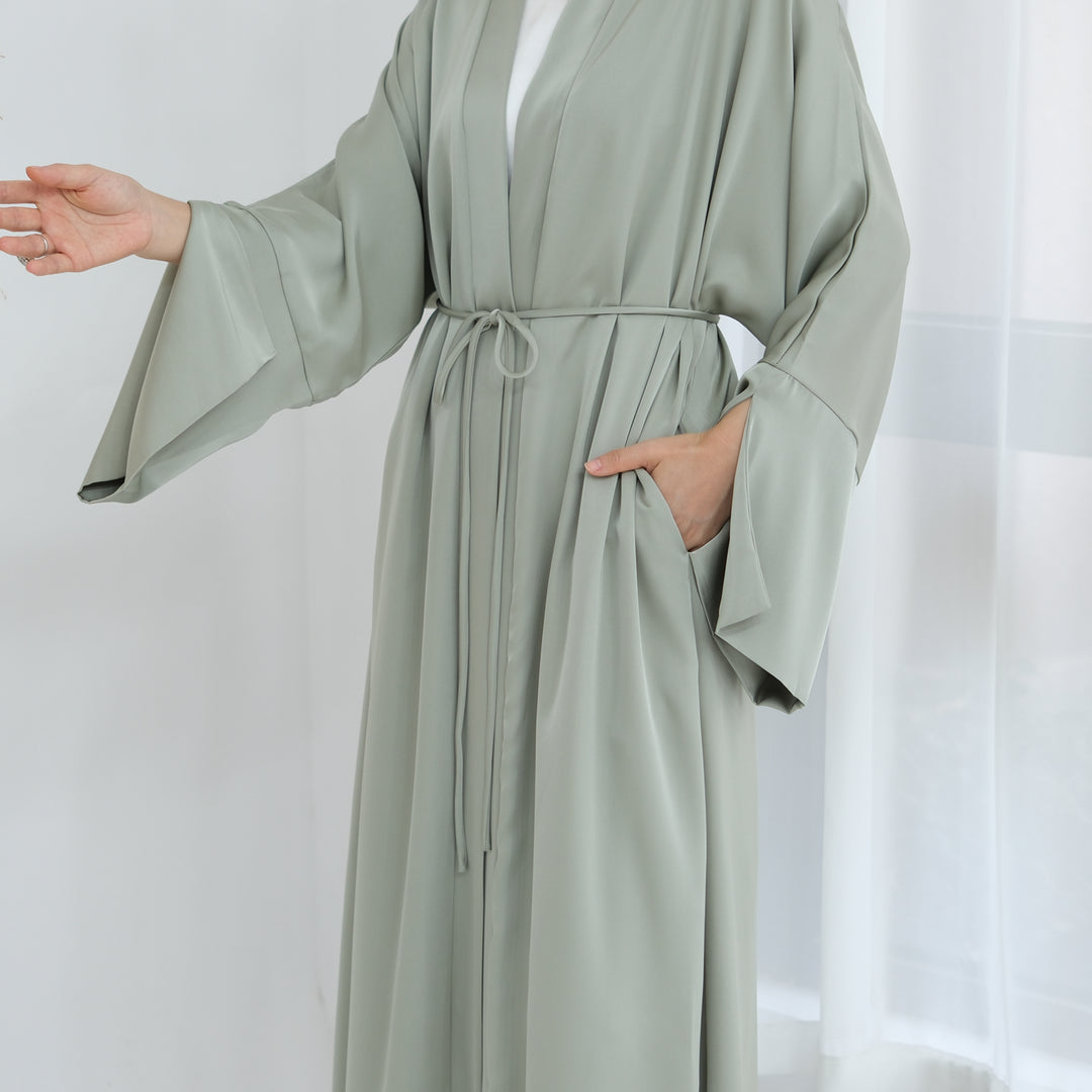 Get trendy with Lavinia Satin Open Abaya - Sage - Cardigan available at Voilee NY. Grab yours for $62.90 today!