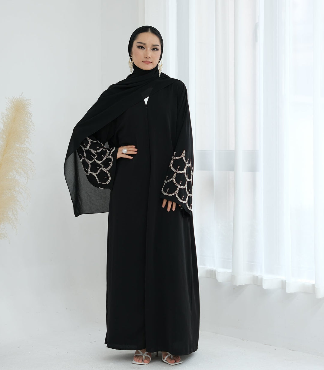 Get trendy with Irssane Nida Open Abaya Kimono - Black - Cardigan available at Voilee NY. Grab yours for $67.90 today!