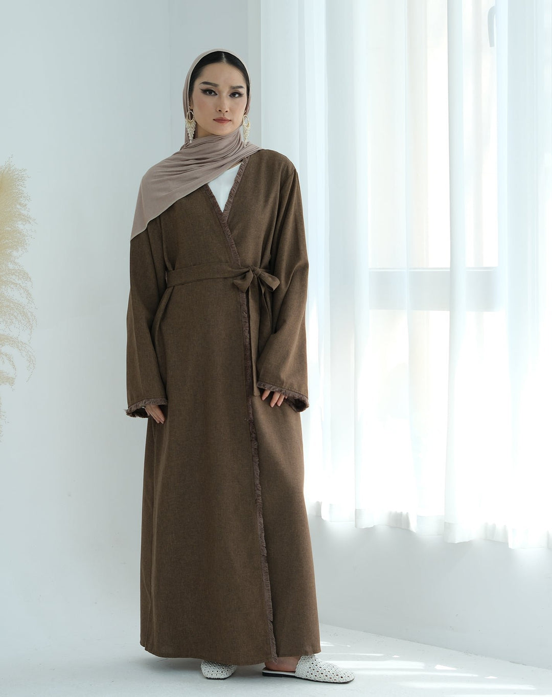 Get trendy with Yara Fringe Belted Duster - Brown - Cardigan available at Voilee NY. Grab yours for $59.90 today!