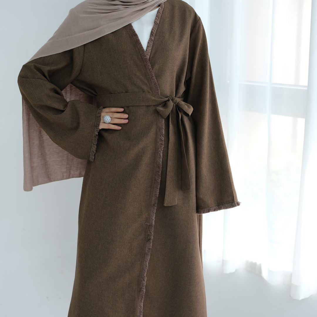 Get trendy with Yara Fringe Belted Duster - Brown - Cardigan available at Voilee NY. Grab yours for $59.90 today!