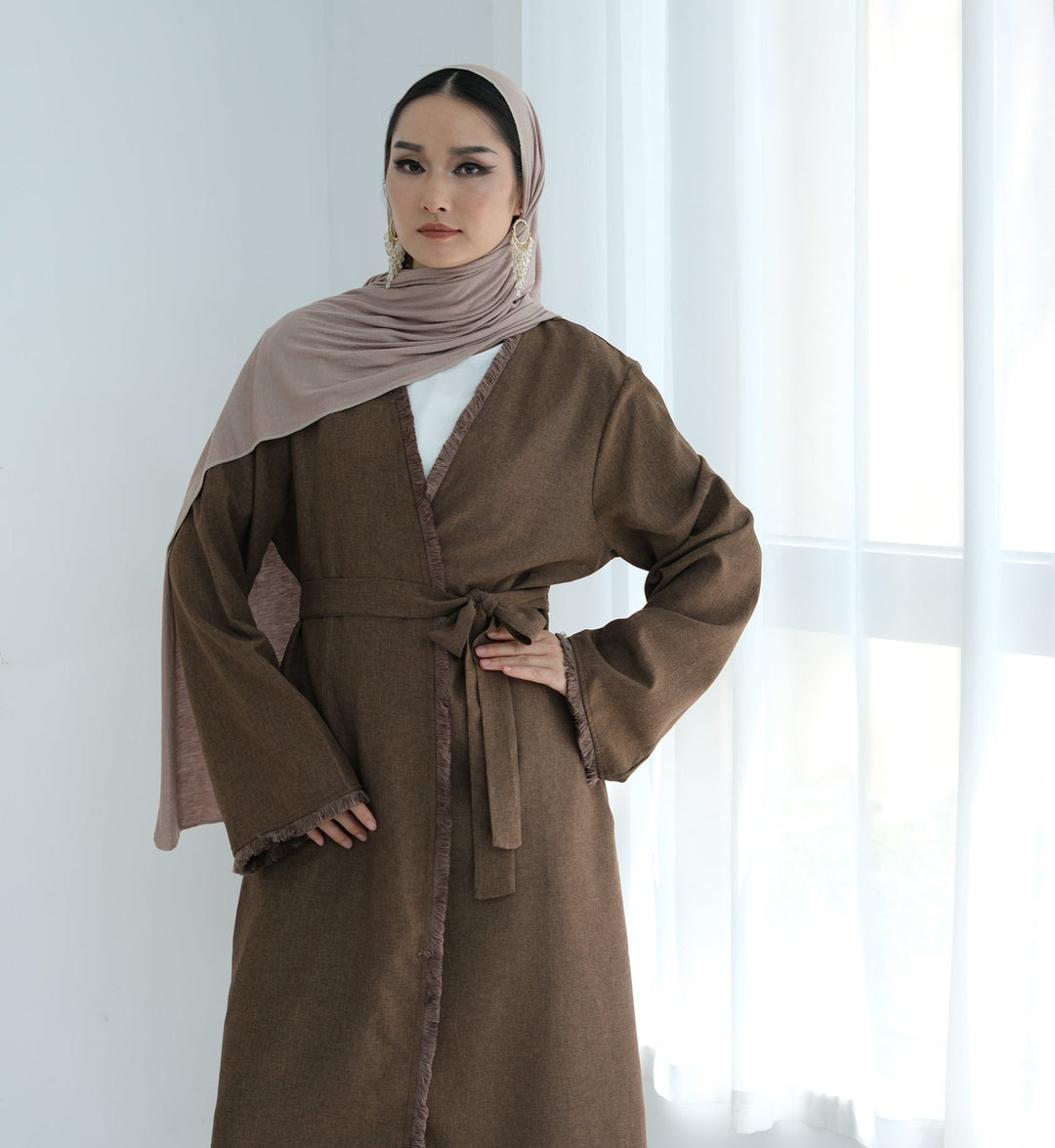 Get trendy with Yara Fringe Belted Duster - Brown - Cardigan available at Voilee NY. Grab yours for $59.90 today!