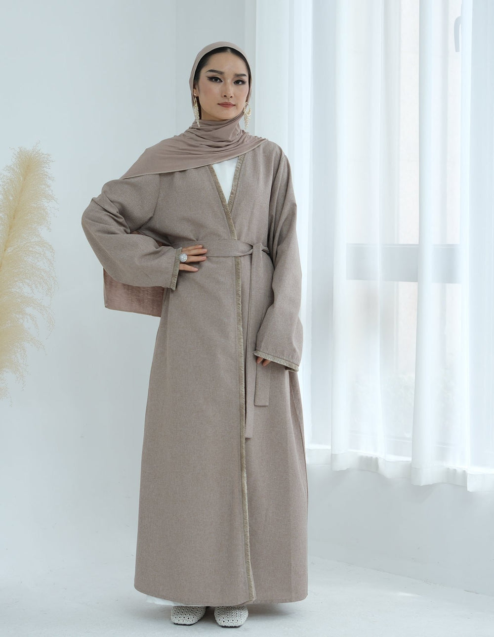 Get trendy with Yara Fringe Belted Duster - Sand - Cardigan available at Voilee NY. Grab yours for $59.90 today!