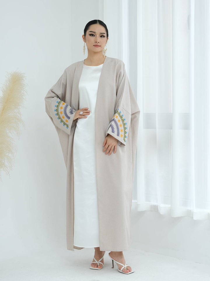 Get trendy with Carin Embroidered Kimono Duster - Sand - Cardigan available at Voilee NY. Grab yours for $59.90 today!