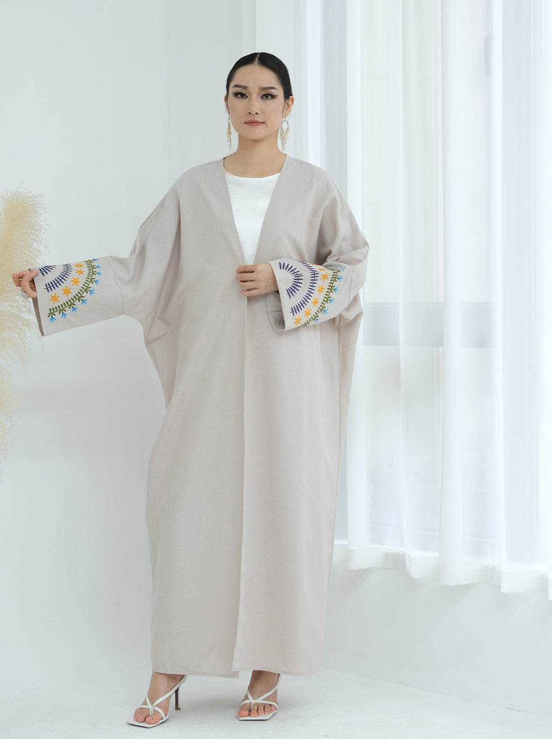 Get trendy with Carin Embroidered Kimono Duster - Sand - Cardigan available at Voilee NY. Grab yours for $59.90 today!