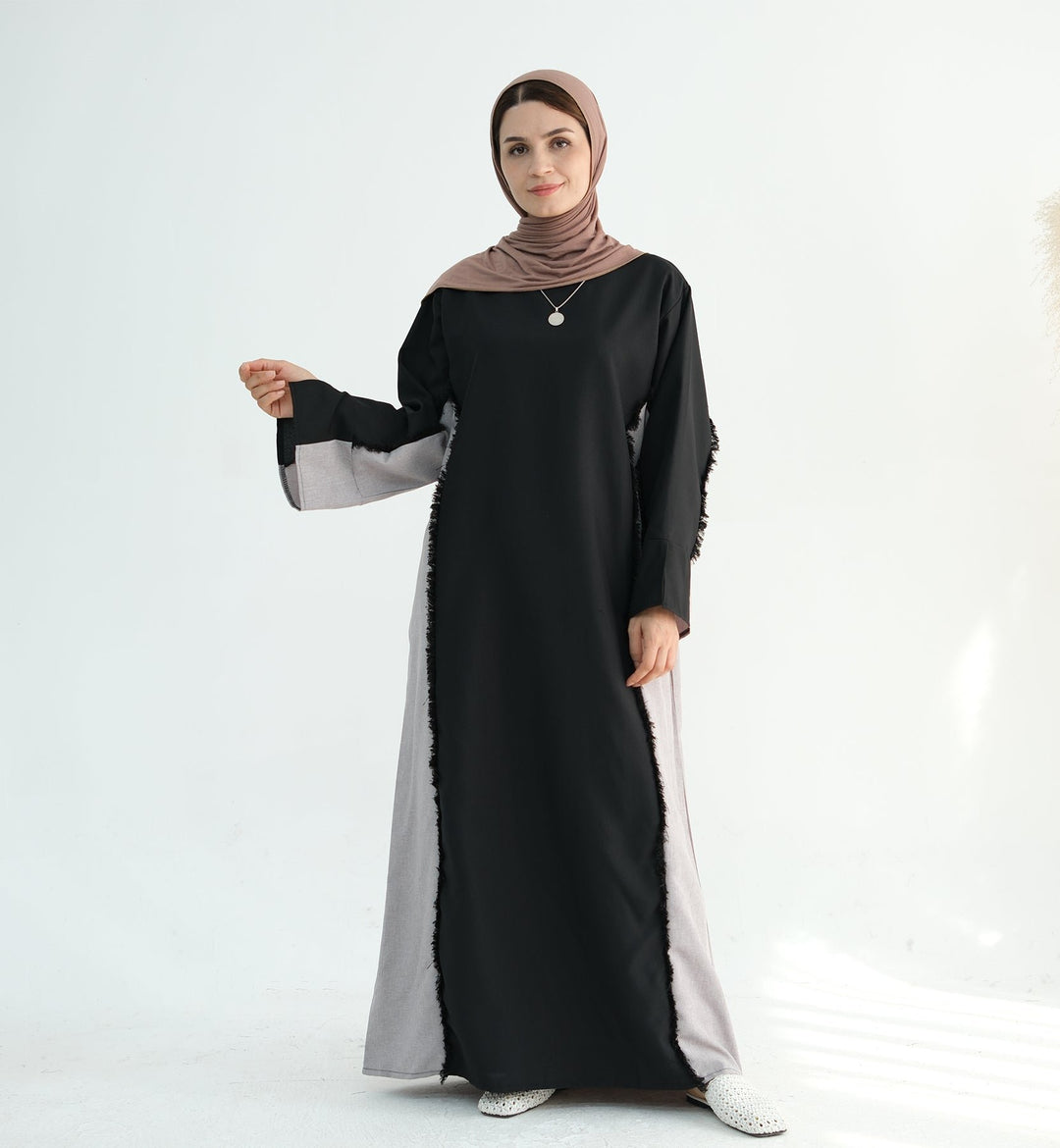 Get trendy with Blair Fringe Abaya Dress - Black - Dresses available at Voilee NY. Grab yours for $54.90 today!