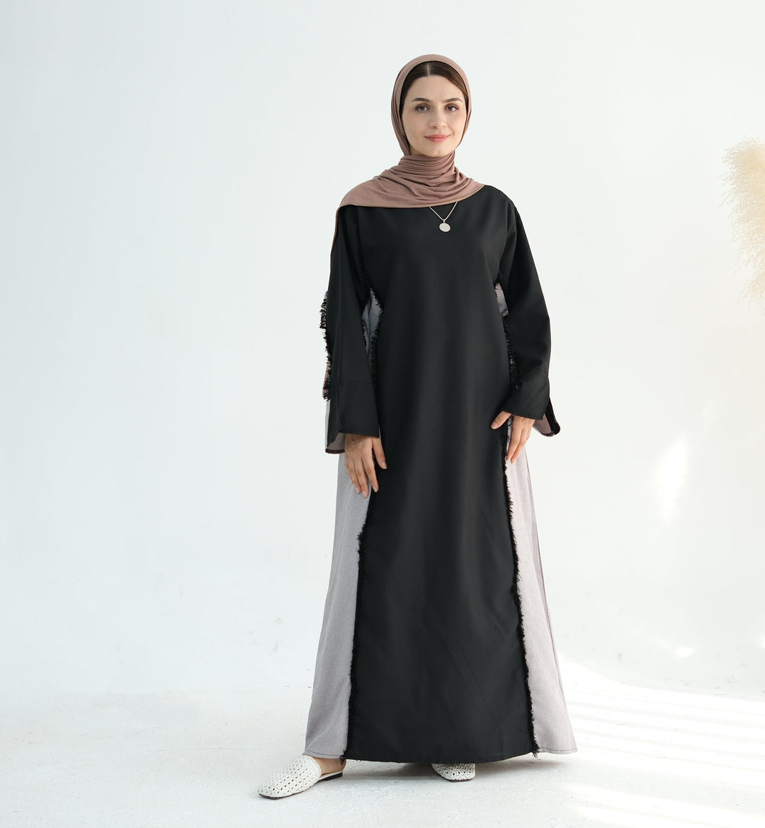 Get trendy with Blair Fringe Abaya Dress - Black - Dresses available at Voilee NY. Grab yours for $54.90 today!