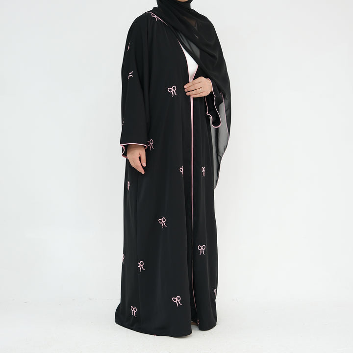 Get trendy with Iona Bowtie Open Abaya Kimono Set - Black - Cardigan available at Voilee NY. Grab yours for $67.90 today!