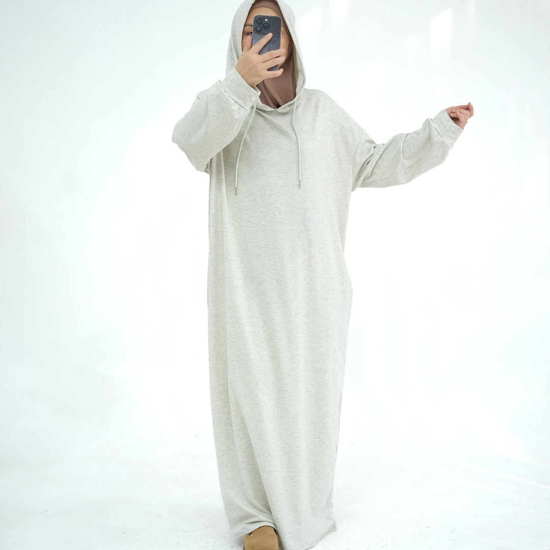 Get trendy with Alora Poly Hoodie Abaya - Light Heather Gray -  available at Voilee NY. Grab yours for $49.90 today!