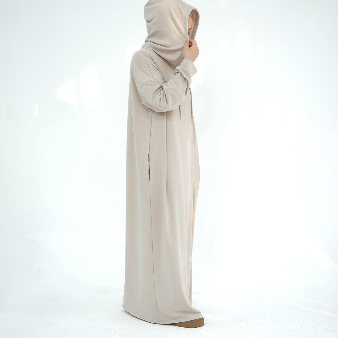 Get trendy with Alora Poly Hoodie Abaya - Sand -  available at Voilee NY. Grab yours for $49.90 today!